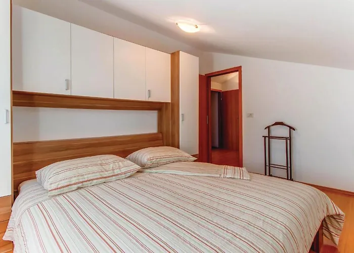 Three-bedroom In Hébergement de vacances *